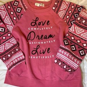 A sweater from Wound up! Side (M)(7-9yrs old).